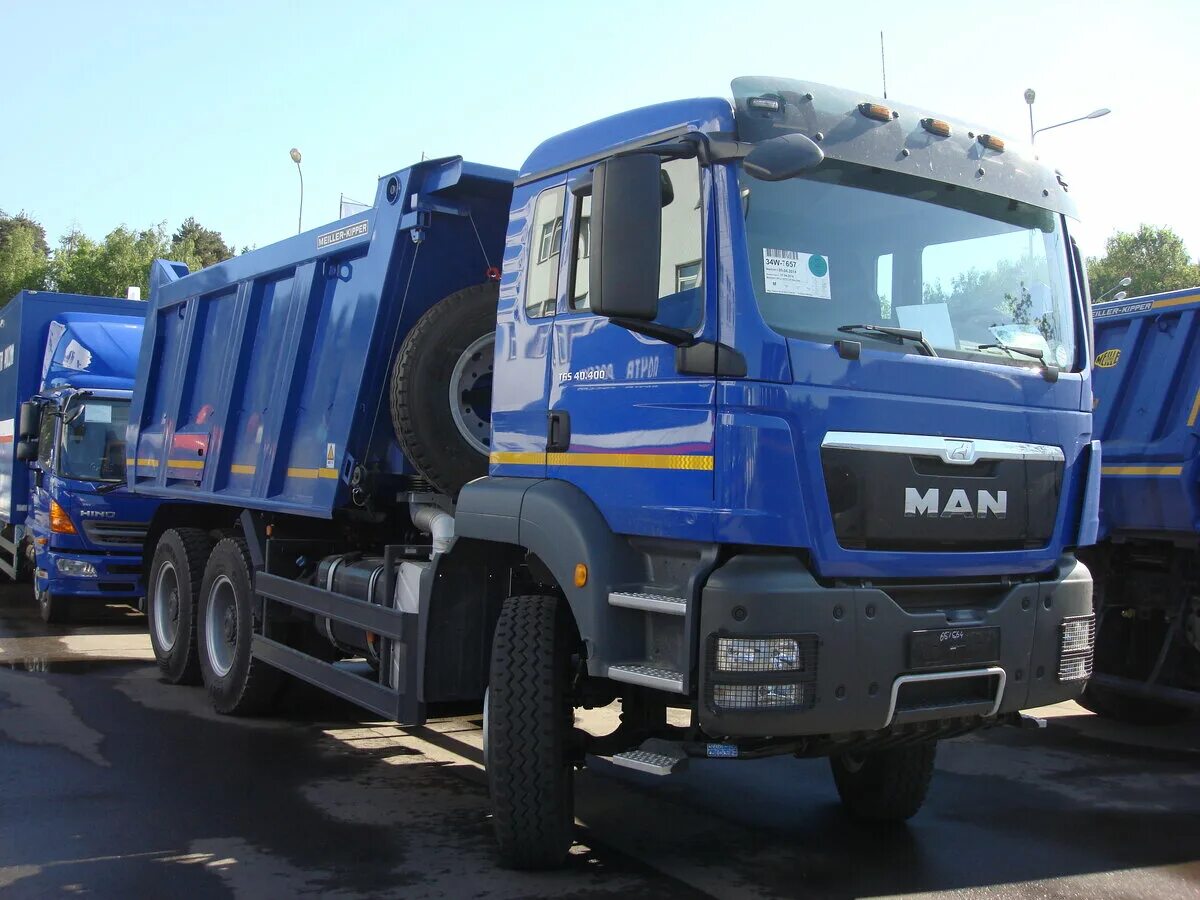 Купить ман самосвал в россии. Man TGS 6x4 самосвал. Ман ТГС самосвал синий. Man TGS 2022 самосвал. Man TGS 40.400.