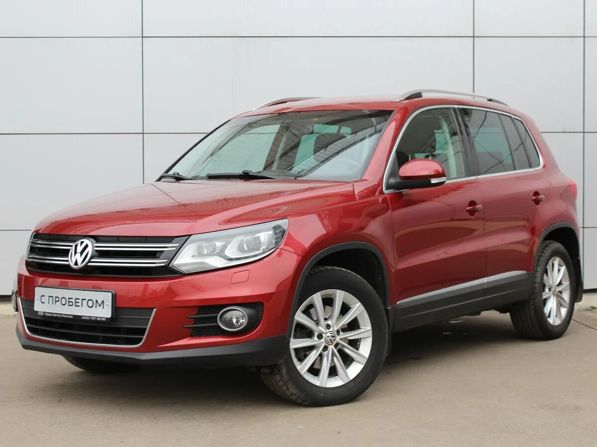 Сколько стоит volkswagen tiguan. VW Tiguan 2012. Volkswagen Tiguan i Рестайлинг. Фольксваген Тигуан 20г. Фольксваген Тигуан красный.