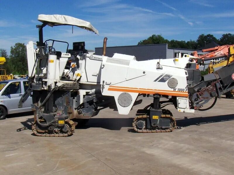 Фреза 2000 wirtgen чертёж. Bomag bm 2000/75. Дорожная фреза xcmg xm2005k. Дорожные фрезы характеристика. Фреза wirtgen w200 чертеж.
