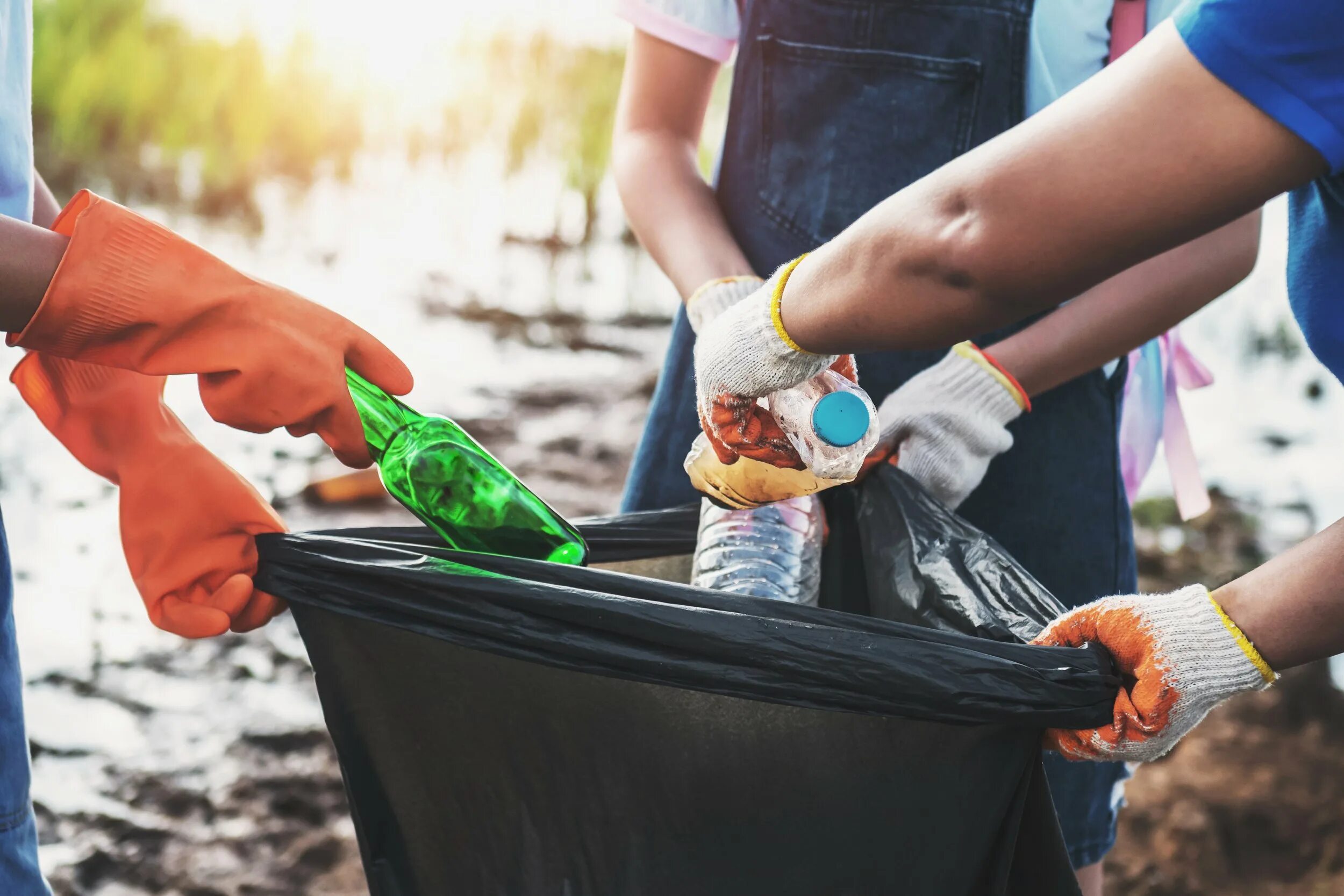 Throwing Garbage in the River. Pick the Litter along the River. Picking up Garbage White Black. Qusay spends everyday picking up a Garbage. Throw object