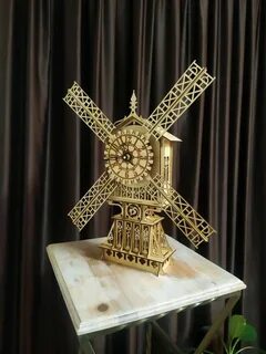 Часы мельница