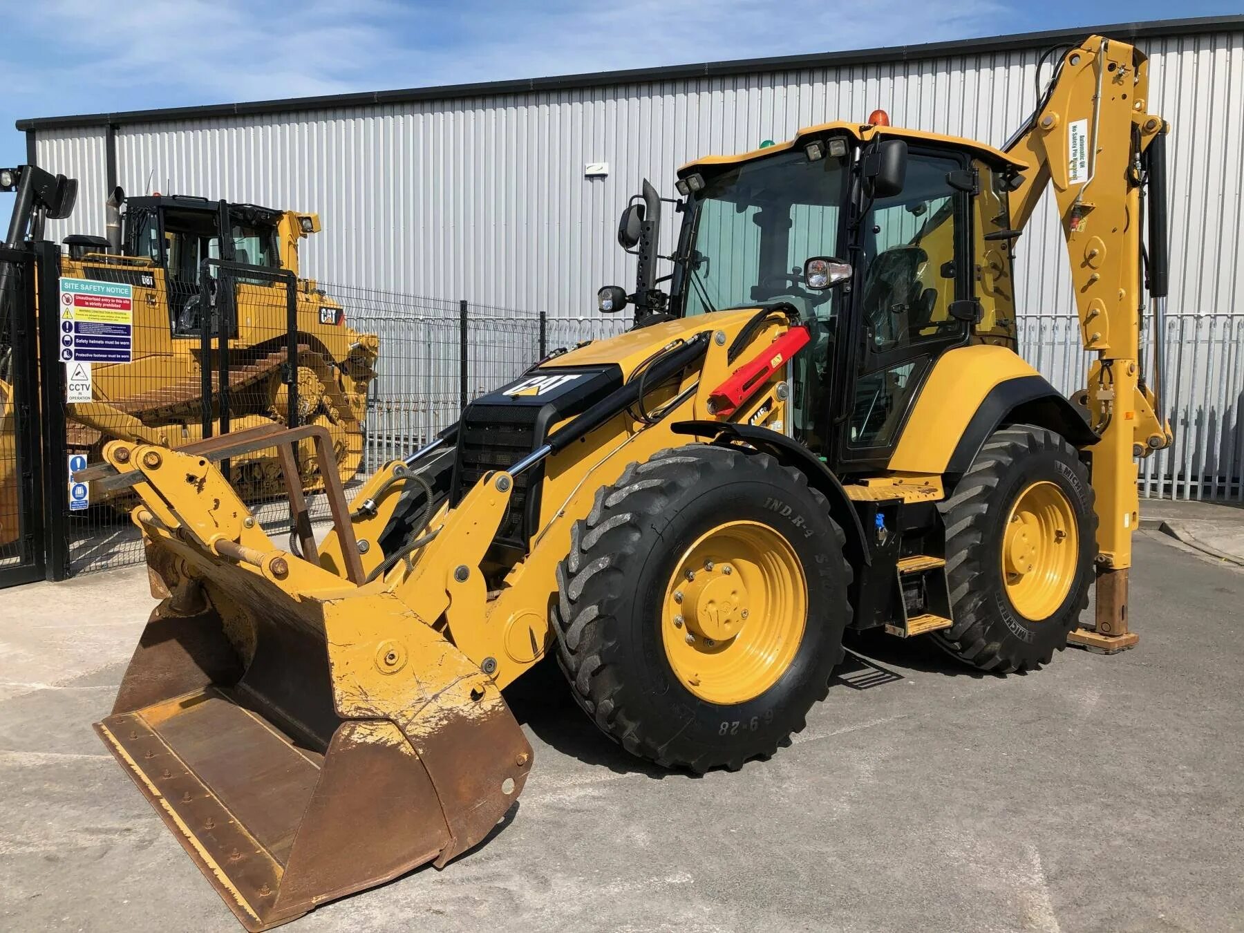 Купить экскаватор катерпиллер. Caterpillar 444f. Катерпиллер 444е. Экскаватор погрузчик Катерпиллер 444. Погрузчик – экскаватор Caterpillar 444f.