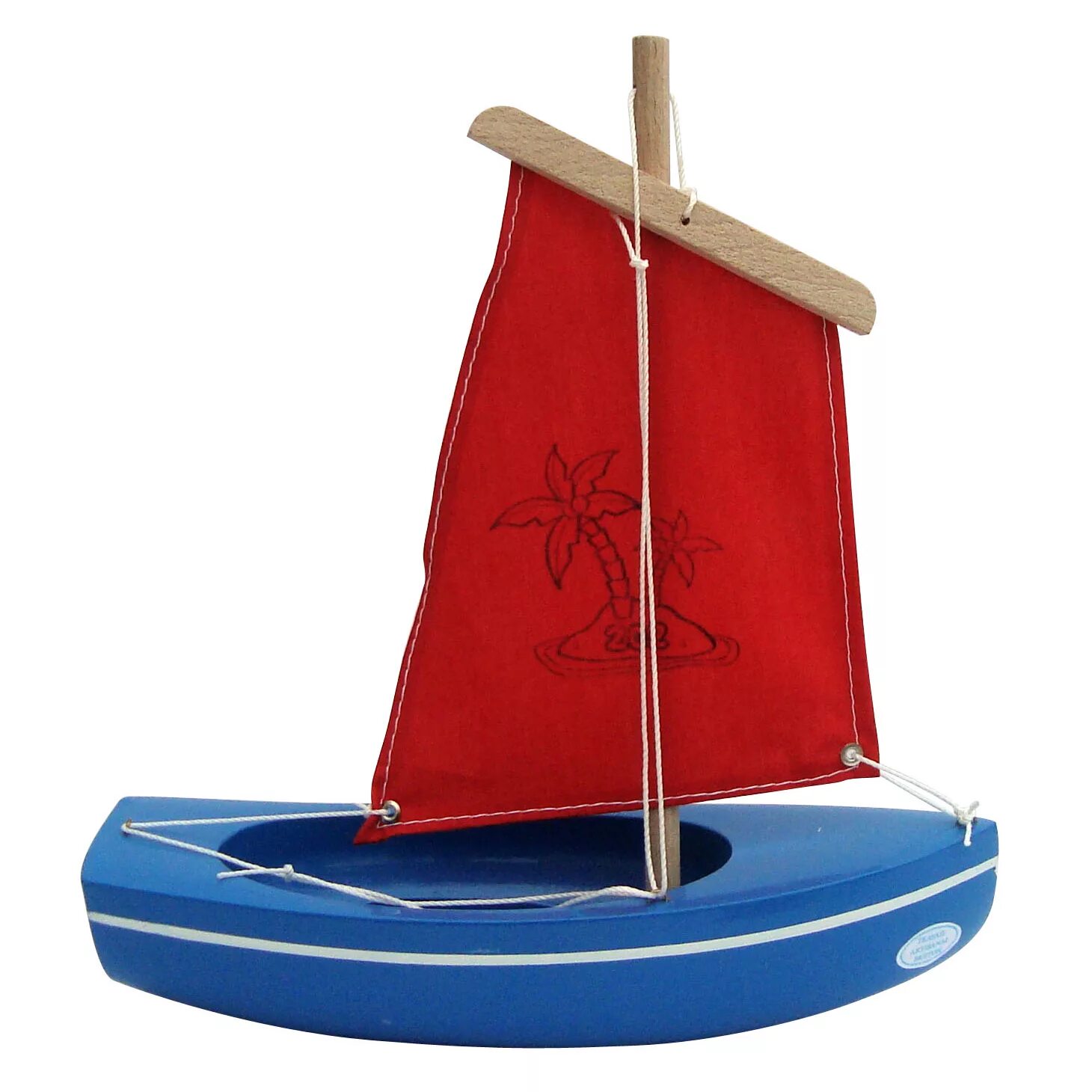 Игрушка "кораблик". Игрушечная лодка. Игрушечная яхта. Парус на игрушечную лодку. Игрушечный кораблик погружен в воду