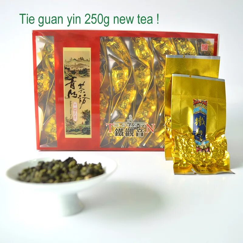 Chinese Tea Gift молочный улун. Китайский чай Tie Guan Yin в упаковке. Китайский зеленый чай в золотой упаковке. Китайский чай в вакуумной упаковке.