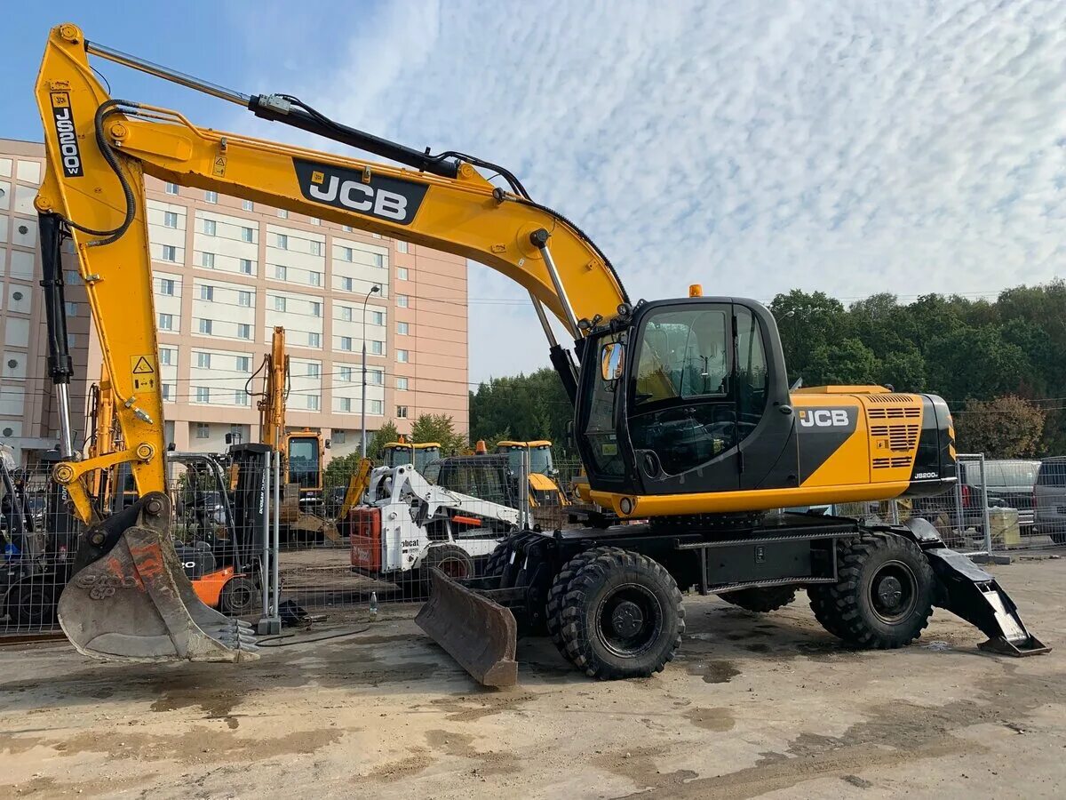 Экскаватор jcb бу. JCB js200w. Экскаватор JCB js200. JCB 200 колесный. Экскаватор JCB js 200 w t2.