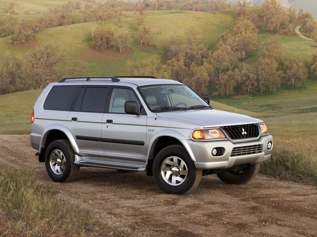 1 монтеро. Митсубиси монтеро спорт 1. mitsubishi montero sport 2. mitsubishi montero sport 2002. mitsubishi montero sport 2003.