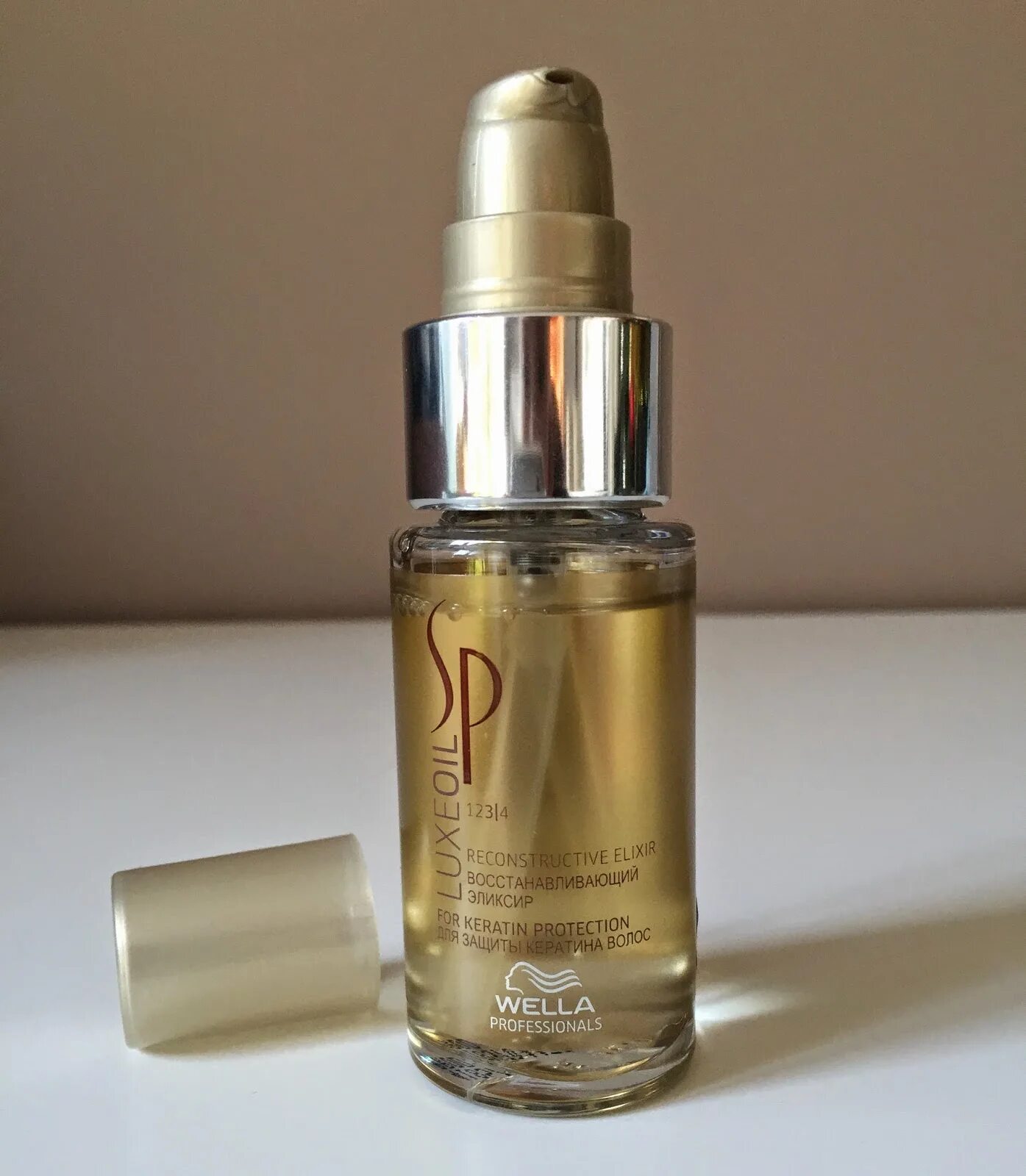 Wella SP Luxe Oil. Wella SP Luxe Oil восстанавливающий эликсир. Wella SP Luxe Oil - восстанавливающий эликсир 100 мл. LUXEOIL Wella масло.