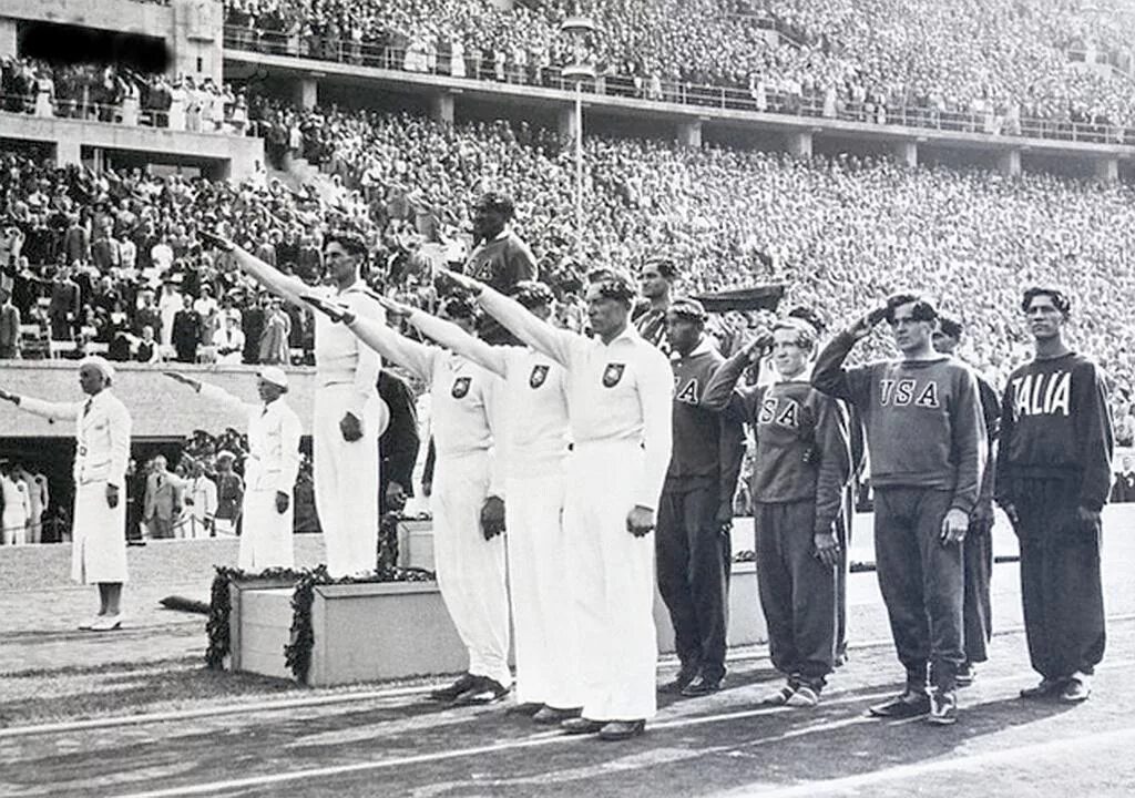 Xi олимпийские игры. Олимпийские игры 1936 Джесси Оуэнс.