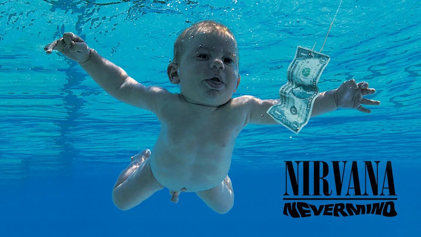 Смелс лайк тин перевод. Нирвана невермайнд обложка. Nirvana альбом Nevermind. Фото группы Nirvana - smells like teen Spirit. Обложка Нирвана с младенцем.