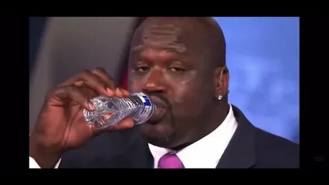 Shaq holding a waterbottle