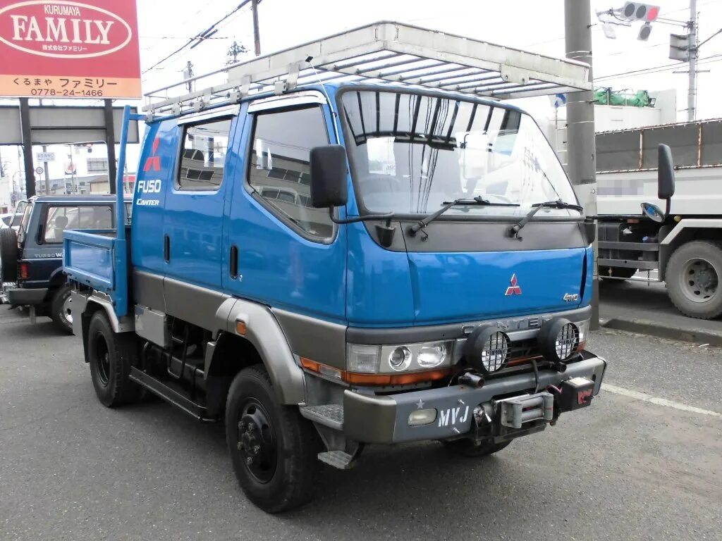 Кабина кантер купить. Митсубиси Canter 4х4. Mitsubishi Canter fg335d. Мицубиси Кантер двухкабинник 4вд. Митсубиси Кантер двухкабинник 4х4 фургон.