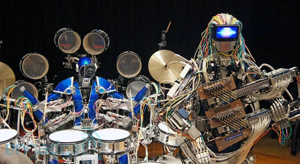 Музыкальная группа роботы. Compressorhead барабанщик. робот музыкант. робот гитарист. группа роботов музыкантов.