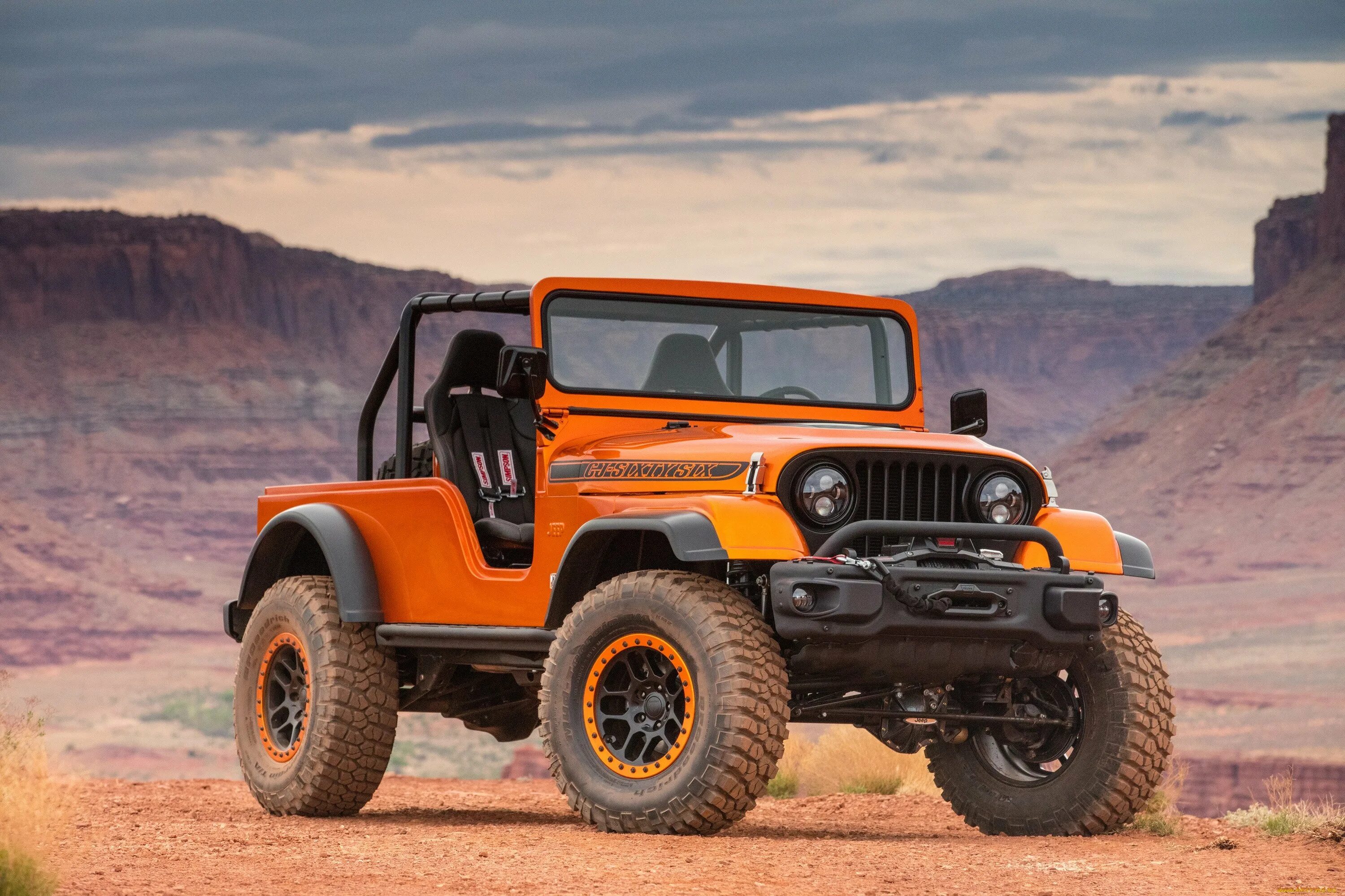 Jeep cj66. Jeep Вранглер оранжевый. Джип Вранглер сафари. 2022 Jeep Wrangler Willys. Что такое внедорожник