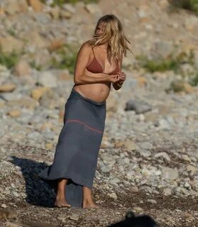 Sienna Miller in a Bikini on the Beach in Ibiza 08202023.