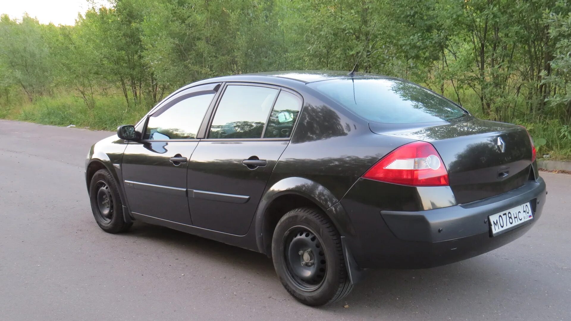 Куплю renault megane 2. Рено Меган 2 черный. Рено Меган 2 седан 2009 черный. Рено Меган 2 седан. Рено Меган 2 на черных штампах.