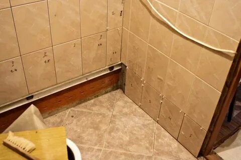 Как укладывать плитку под ванной