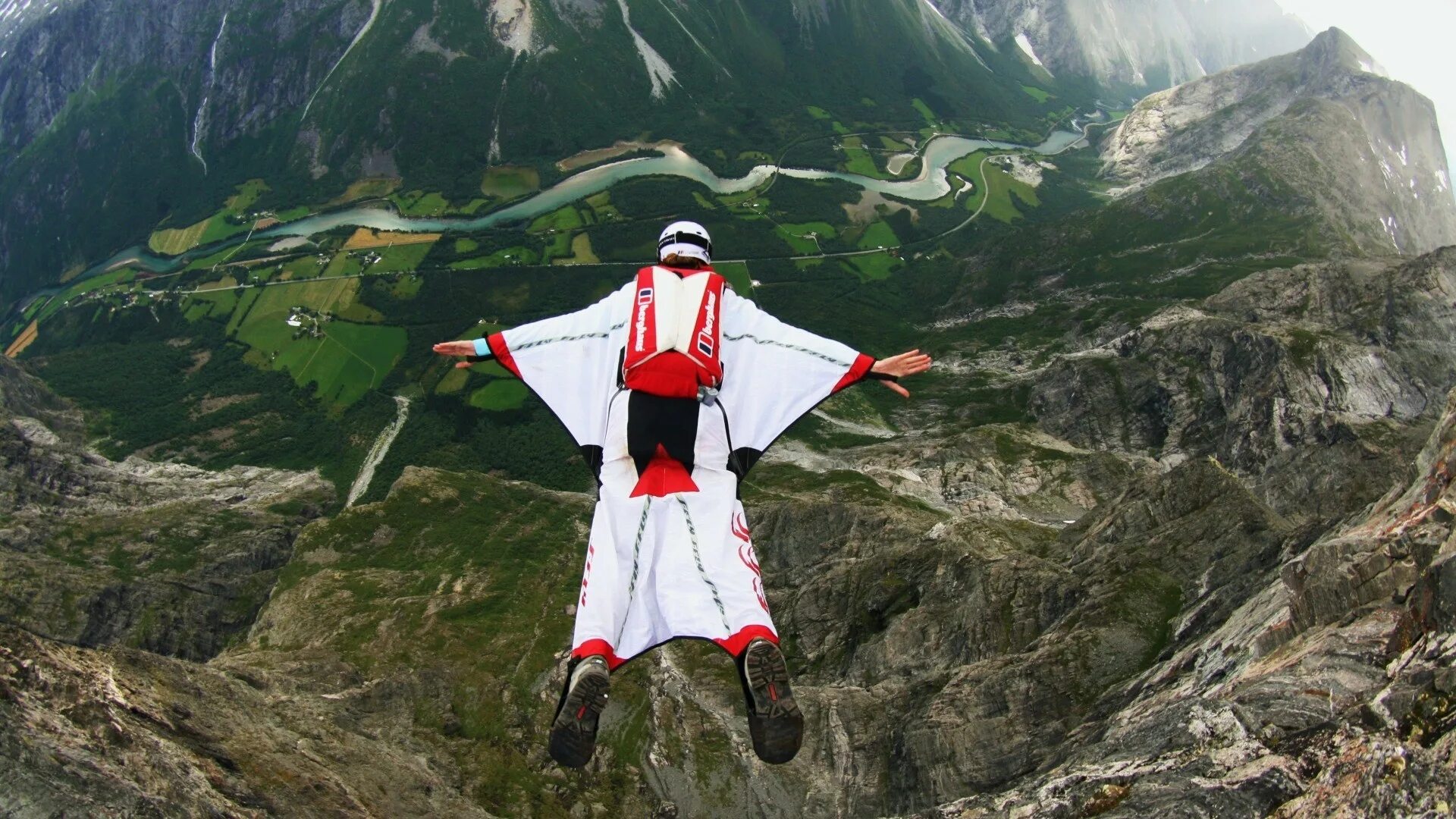 Wingsuit fly. Полет вингсьют горы. Джонатан Флорес вингсьют. Водопад Анхель бейсджампинг. Цей Лоам бейсджампинг.