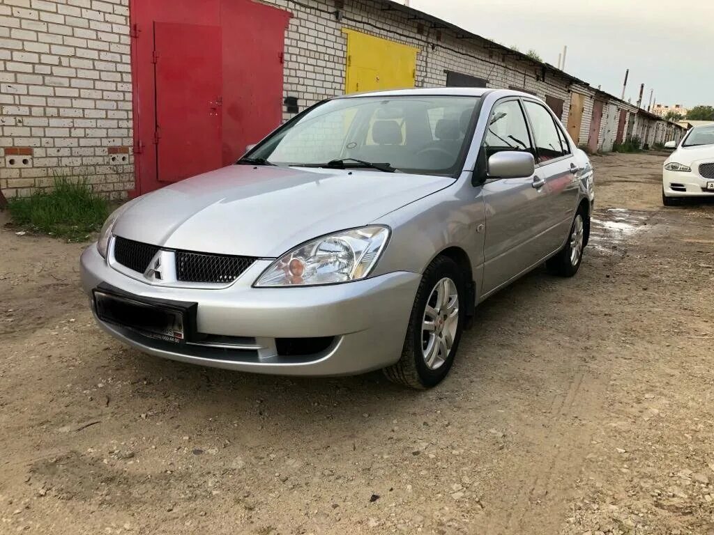 Мицубиси 2003г. Mitsubishi Lancer IX 2003. Митсубиси Лансер 9 2003г. Митсубиси седан 2003. Mitsubishi 2003 года.