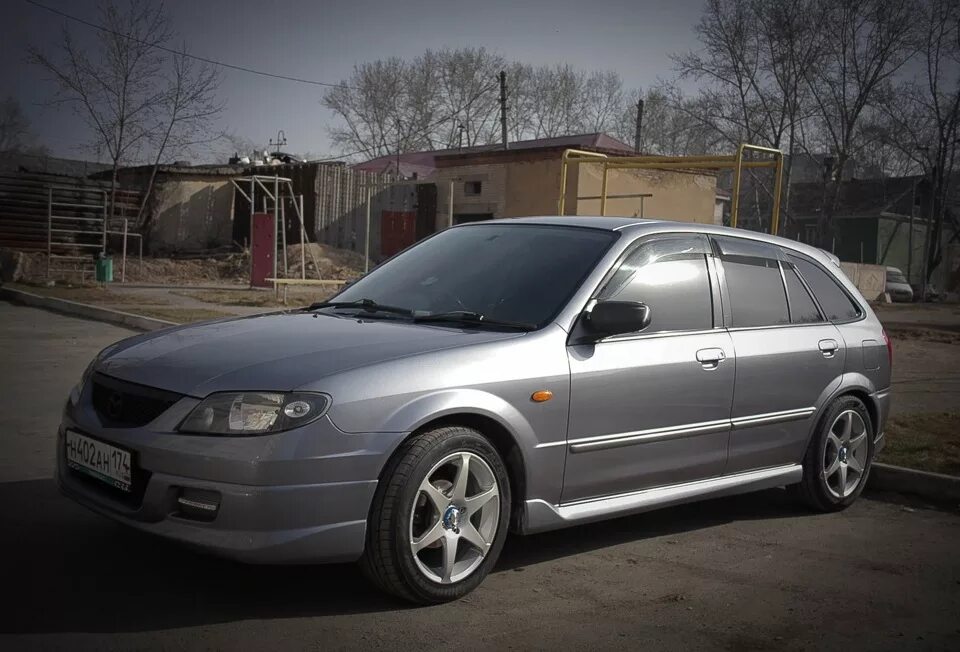 195/55 r16 mazda familia. Мазда фамилия на 17 дисках. Мазда фамилия на дисках. Мазда фамилия на 16 дисках. Mazda familia на r17.