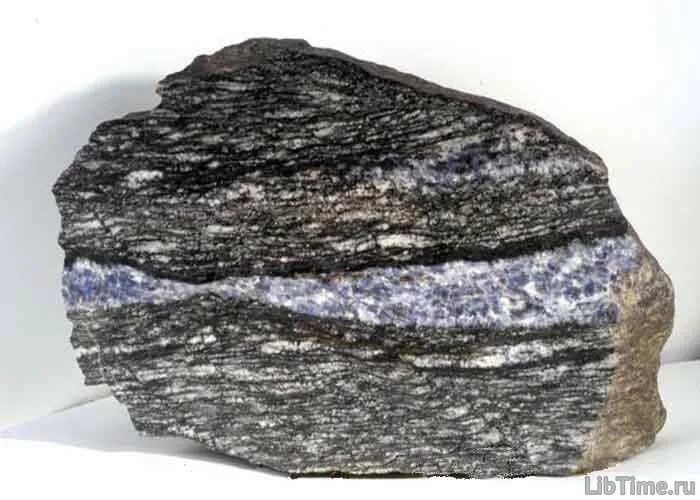 Гранит гнейс. Гнейс метаморфическая горная порода. Quartzite. Кварцит гнейс. Кварцит гнейс.