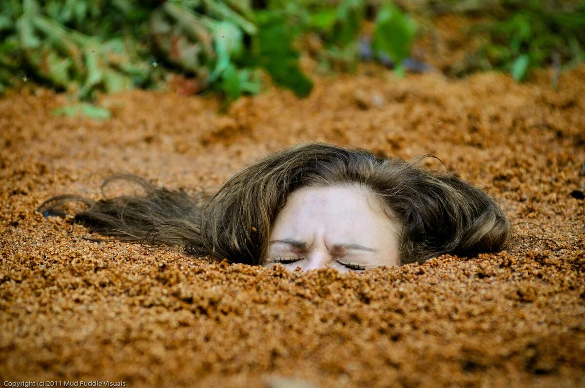 Girl in quicksand. Quicksand.