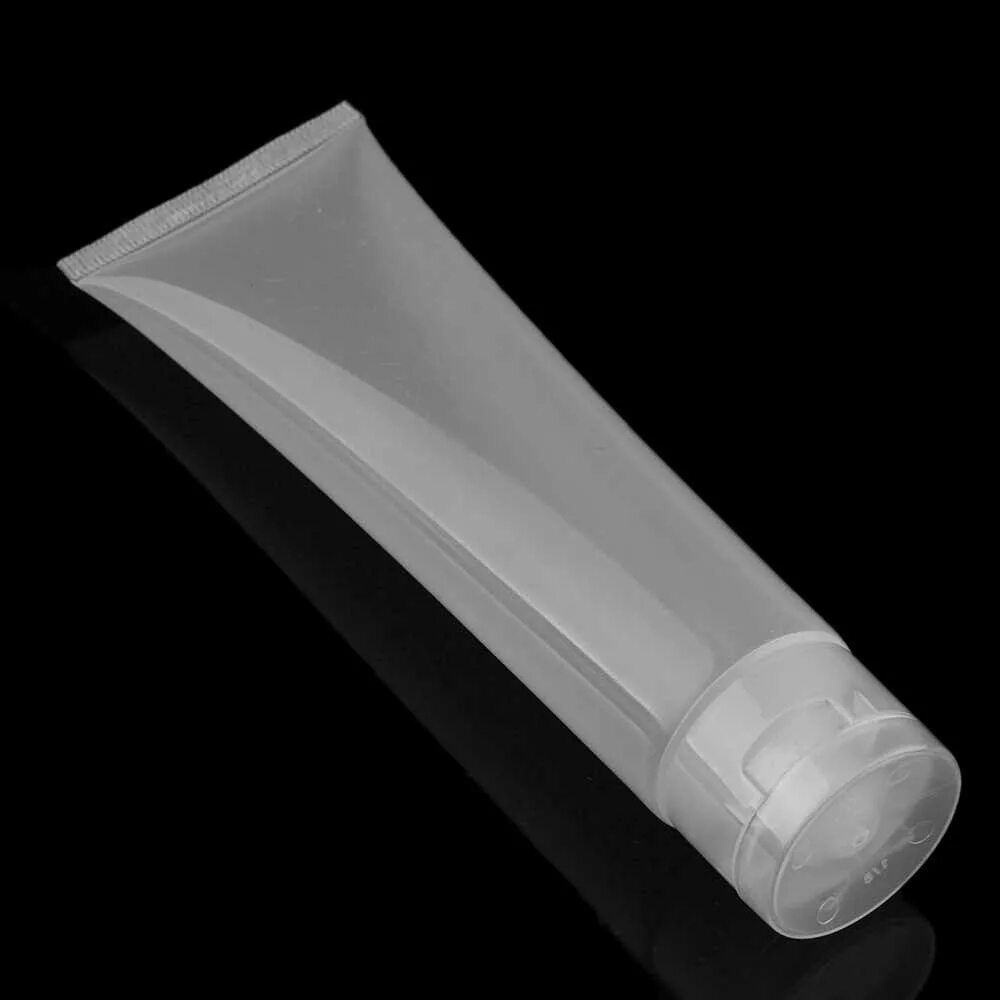 пустой тюбик. туба белая 100 мл и 10 мл. пластмассовый тюбик. пустой тюбик. белый тюбик на белом фоне.