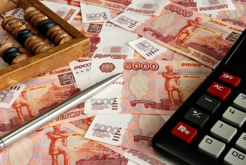 Налог с 1000000 рублей. Деньги на счету. Калькулятор и деньги. Бухгалтер деньги. Счеты и деньги.