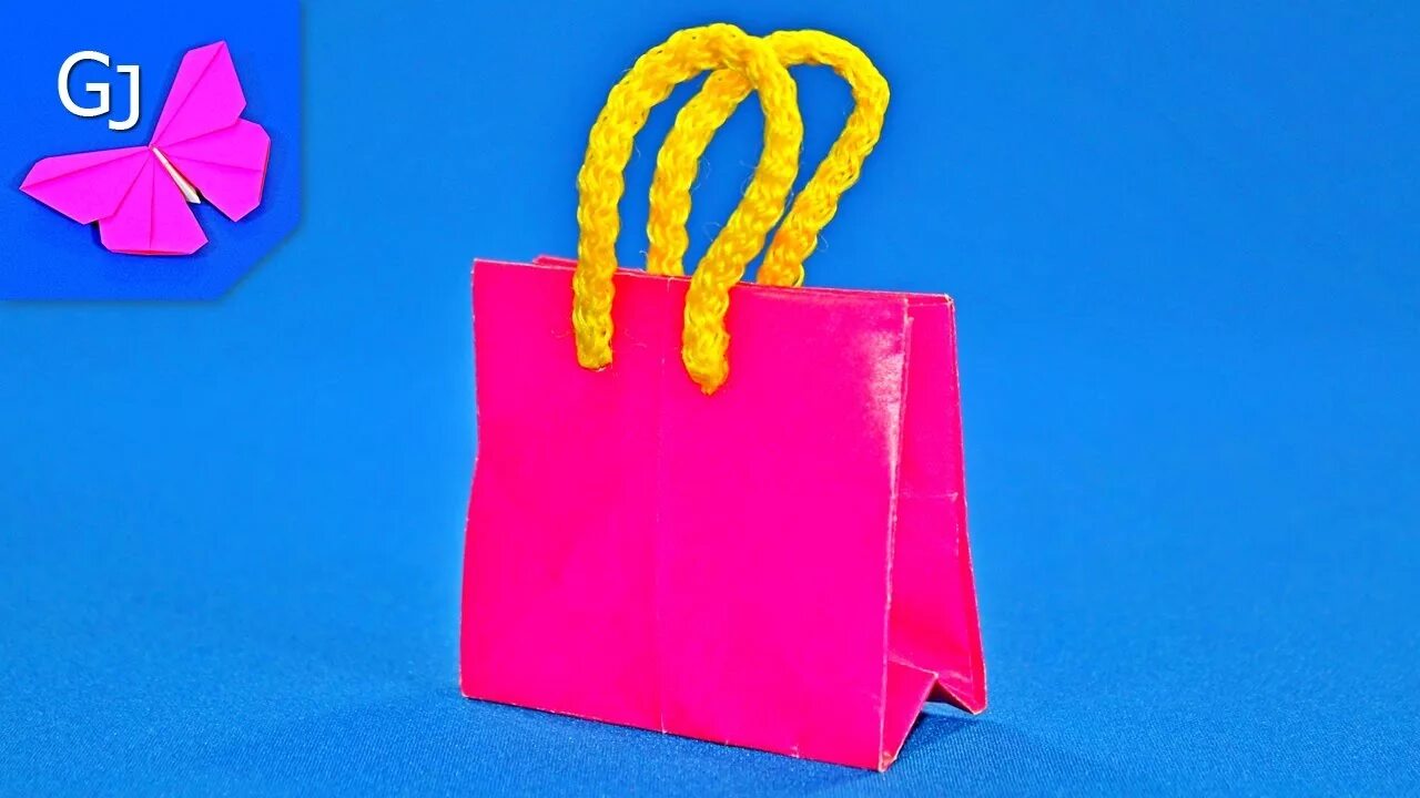 Сумка пакет из цветной бумаги 1 класс. Сумка из бумаги. Сумка оригами. Оригами сумочка из бумаги. Сумочка оригами из бумаги для детей.