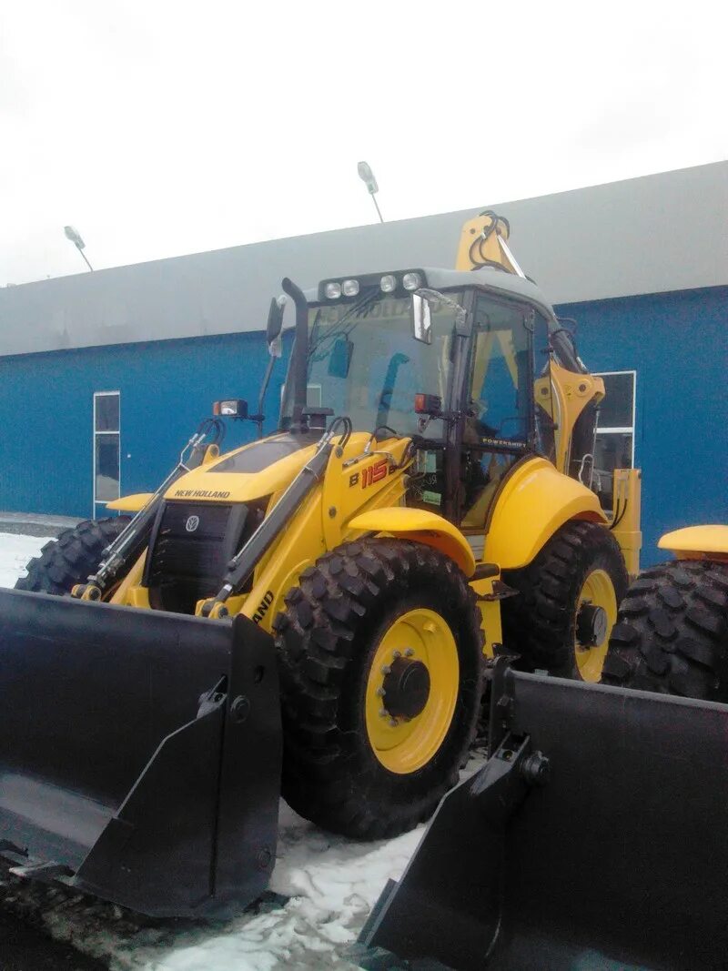 New holland 115. Погрузчик New Holland b115b. Экскаватор погрузчик Нью Холланд 115. Экскаватор New Holland b115b. Новый New Holland b115b.