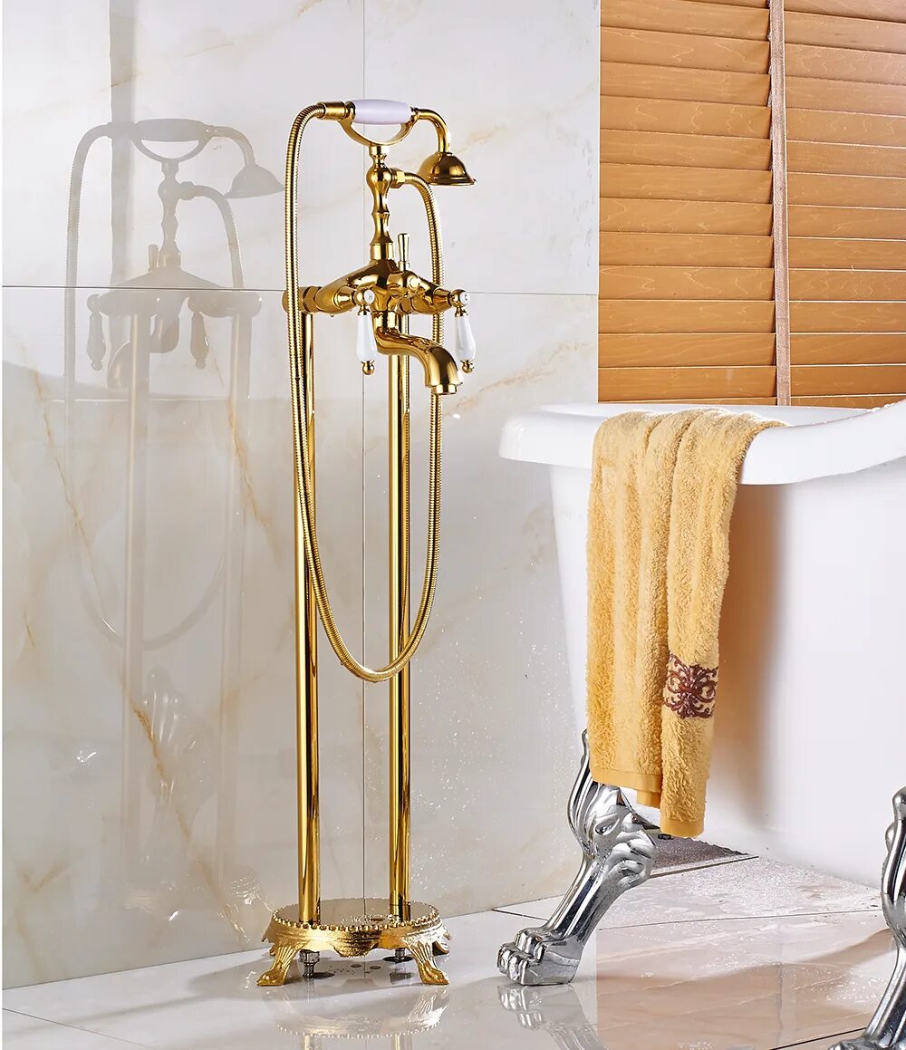 Bossini золотой смеситель. Bossini напольный смеситель для ванны. Смеситель стоячий для ванной. Смеситель для ванны отдельностоящий золото.