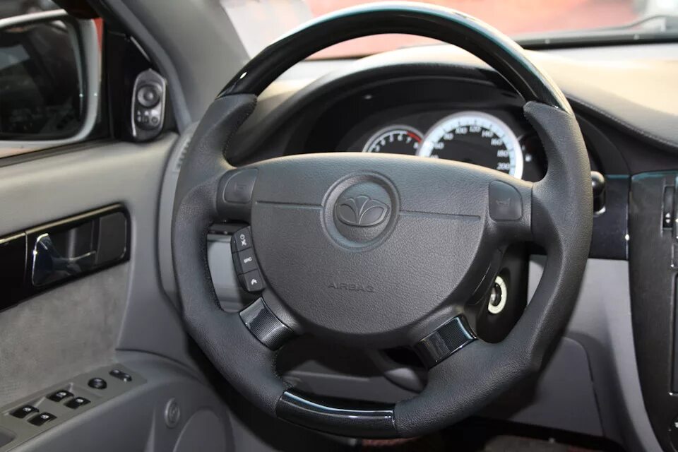 Оплетка руля daewoo gentra. Руль дэу джентра. Руль лачетти джентра. Руль дэу джентра. Руль дэу джентра.