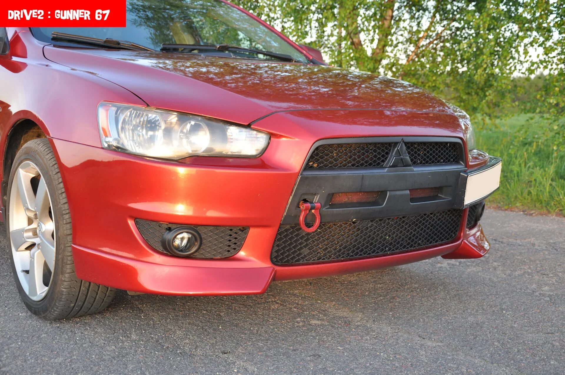 Крепление бампера лансер 10 передний. Lancer 10 клыки. клыки на митсубиси лансер 10. клыки мицубиси лансер 10. передний бампер мицубиси лансер 10.