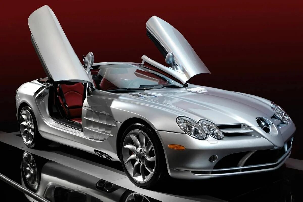 Mercedes-benz slr mclaren 722 gt. Мерседес макларен белый. Мерседес двухместный макларен. Кадиллак макларен мерседес и порше. Мерседес макларен 2007.