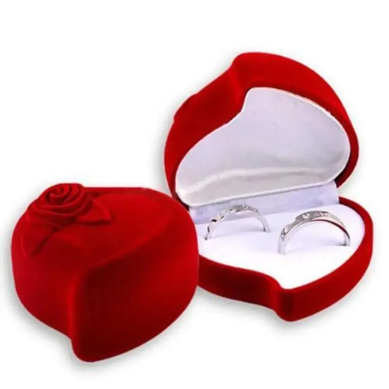 Украшения в красной коробке. Кольцо в коробочке. Футляр для свадебных колец. Обручальное кольцо в коробочке. Кольцо в красной коробочке.