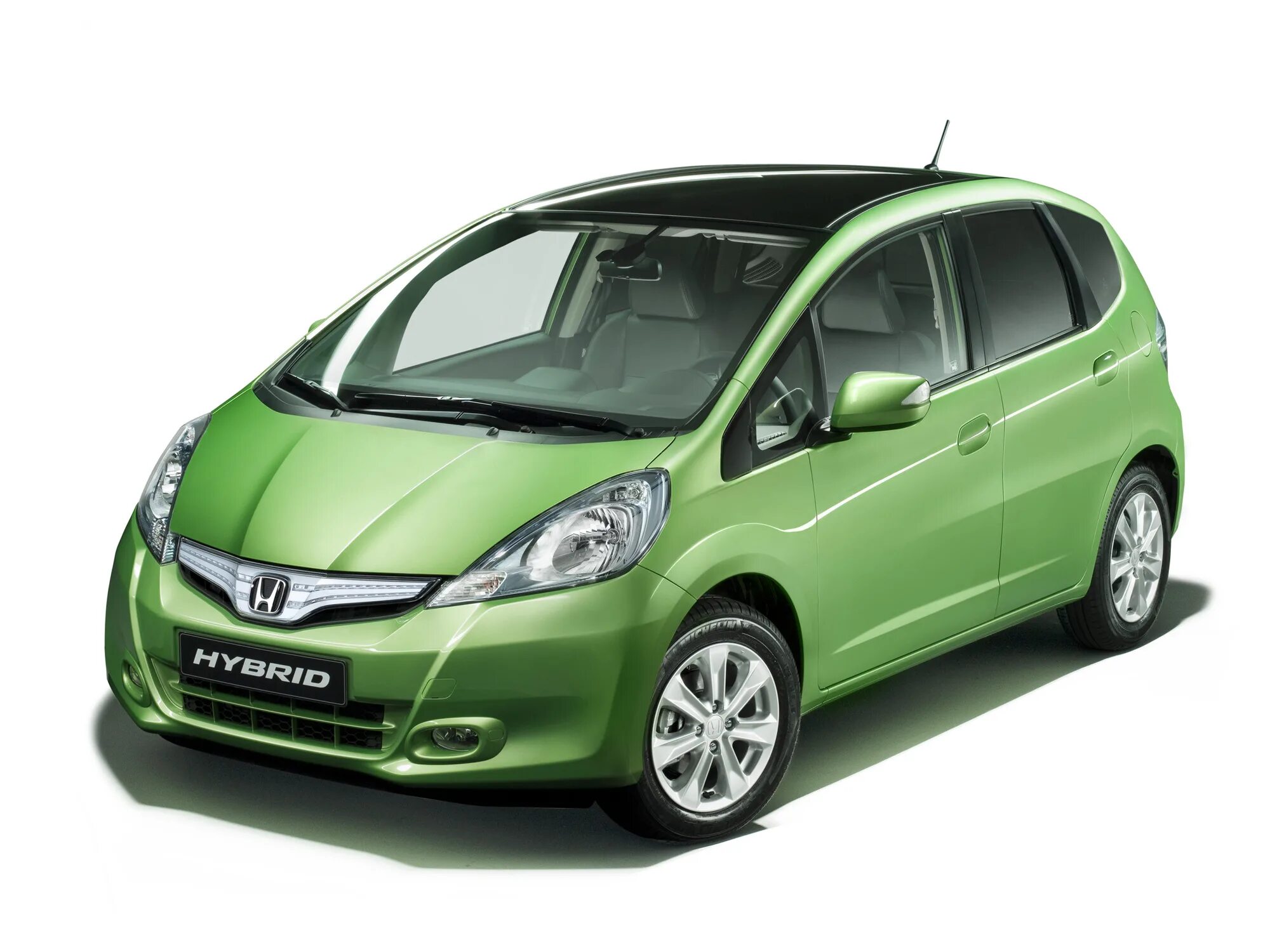 Гибрид продажа автомобиля. Honda Jazz Hybrid 2012. Honda Fit Jazz Hybrid. Хонда фит 2 гибрид. Honda Jazz 2011.