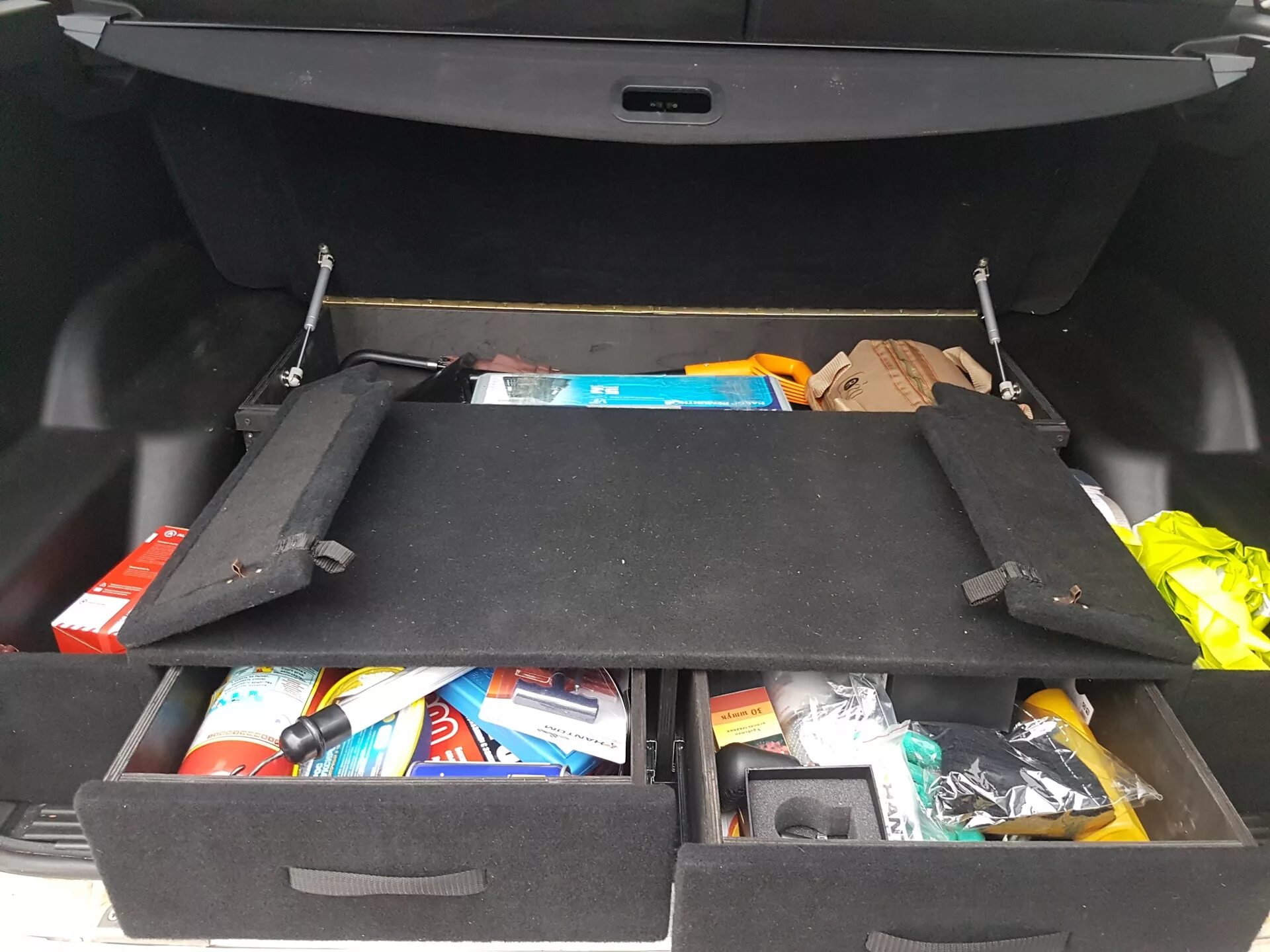 Ящик в багажник купить. Hyundai Tucson 1 органайзер в багажник. Органайзер полка(Hyundai ix55). Органайзер в багажник ix35. Органайзер в багажник Chrysler Voyager.