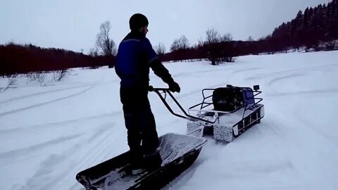 Лучшие мотобуксировщики для глубокого снега
