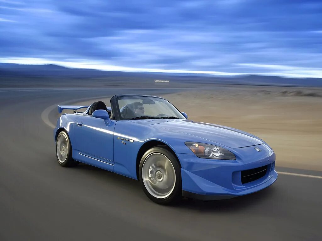 Каталог автомобилей Honda S2000 2.2 MT (242 л.с.). Характеристики, история, прод