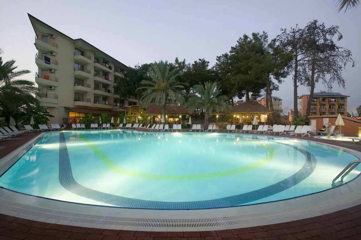 Palm dor hotel 4* кумкой, сиде. мелас холидей виладж сиде турция. пальм дор отель в сиде номер двухкомнатный. турция кумкой palm dor hotel. палм дор сиде турция.