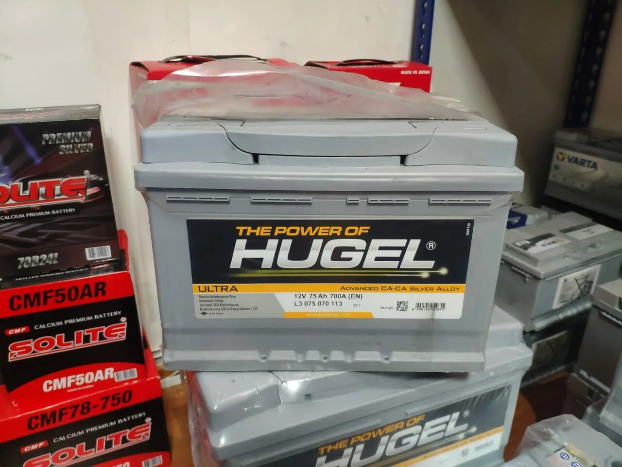 Аккумулятор hugel. Аккумулятор автомобильный 75 hugel. hugel аккумулятор 4445. hugel action l1 050 045 113 50 ач. hugel 444 5 аккумулятор.