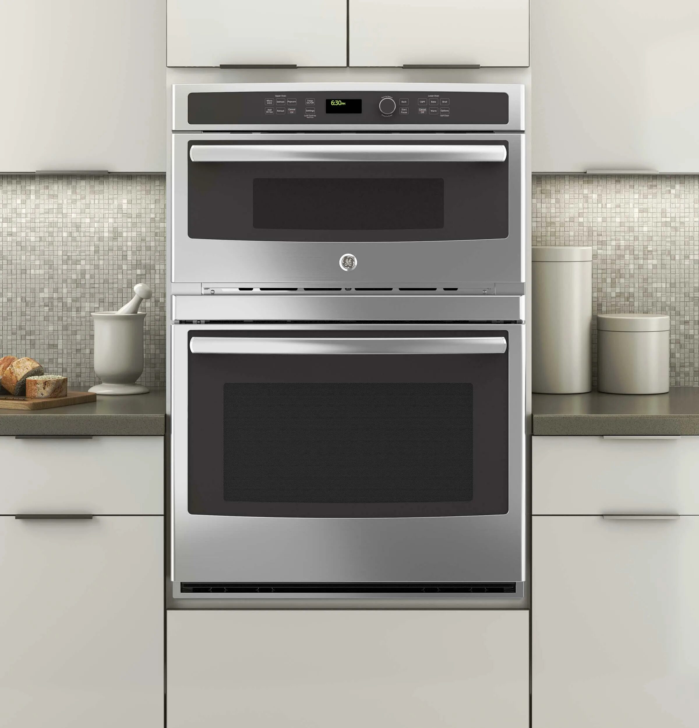 Духовых шкафов с свч bosch. Ge Wall Ovens Microwave Combo. Встроенная духовка Ханса с микроволновкой. Bosch совмещенная микроволновка с духовкой. Колонна духовка и микроволновка Bosch.