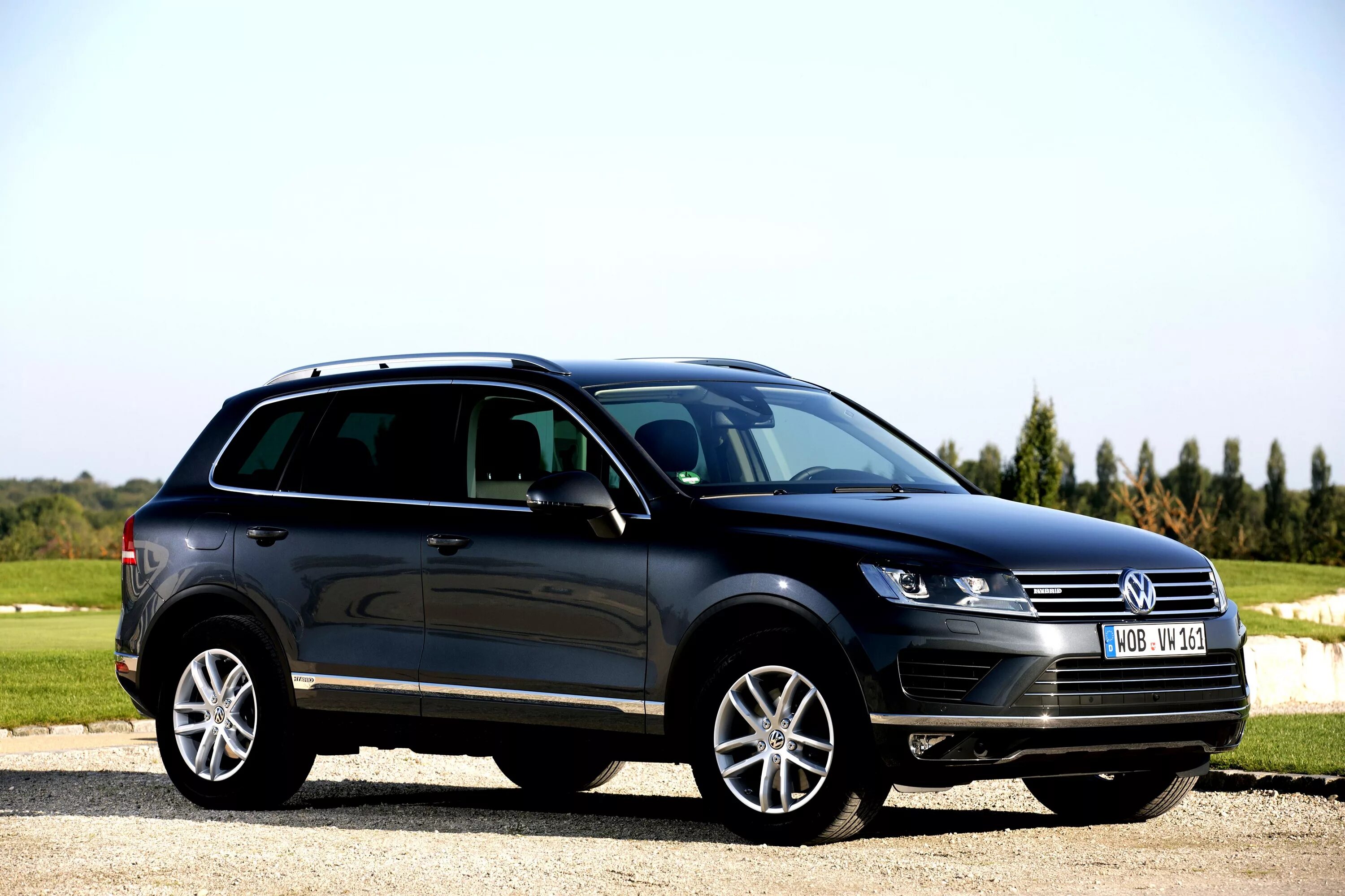 Туарег сколько литров. Volkswagen Touareg Hybrid. VW Touareg 2014. Фольксваген Туарег 2015. Фольксваген Туарег 2011.