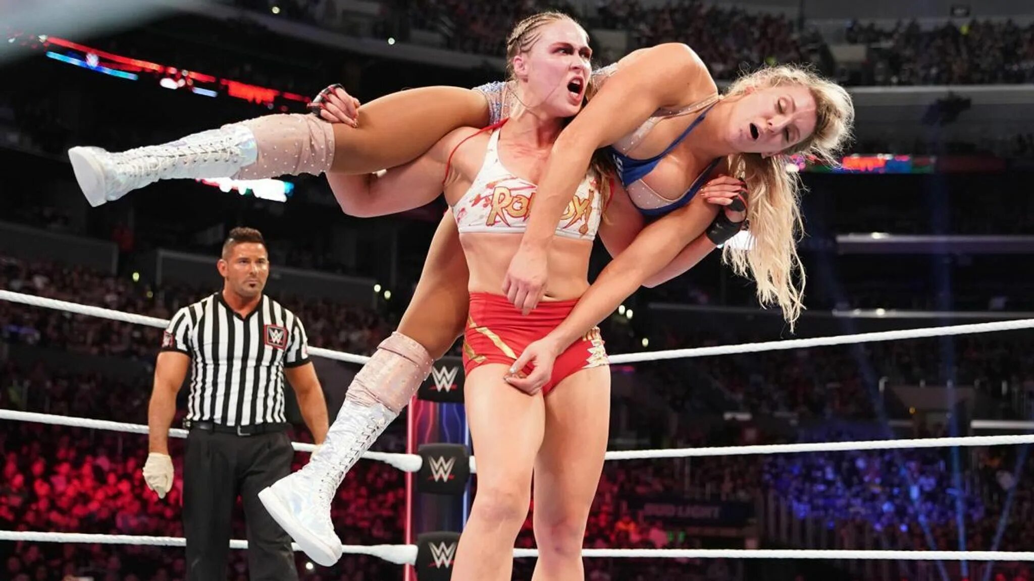 Ронда Роузи WWE бои. Charlotte Flair vs Ronda Rousey. Ронда Роузи WWE. Ронда Роузи WWE 2018.