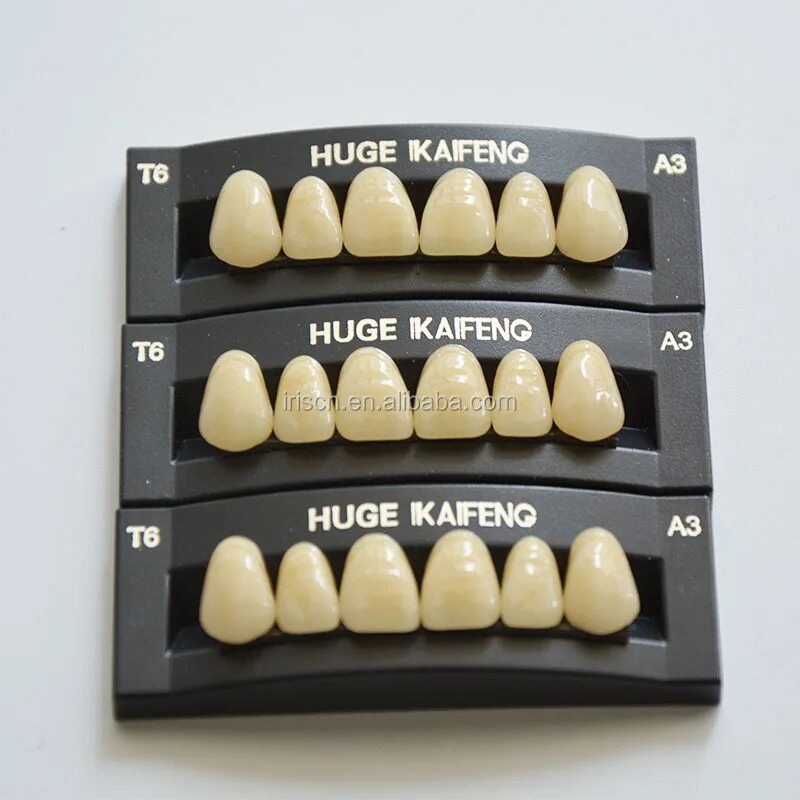 Изгиб зубов. Гарнитуры зубов Ivoclar a2. Пластмассовые искусственные зубы. Гарнитура искусственных зубов. Акриловые зубы.
