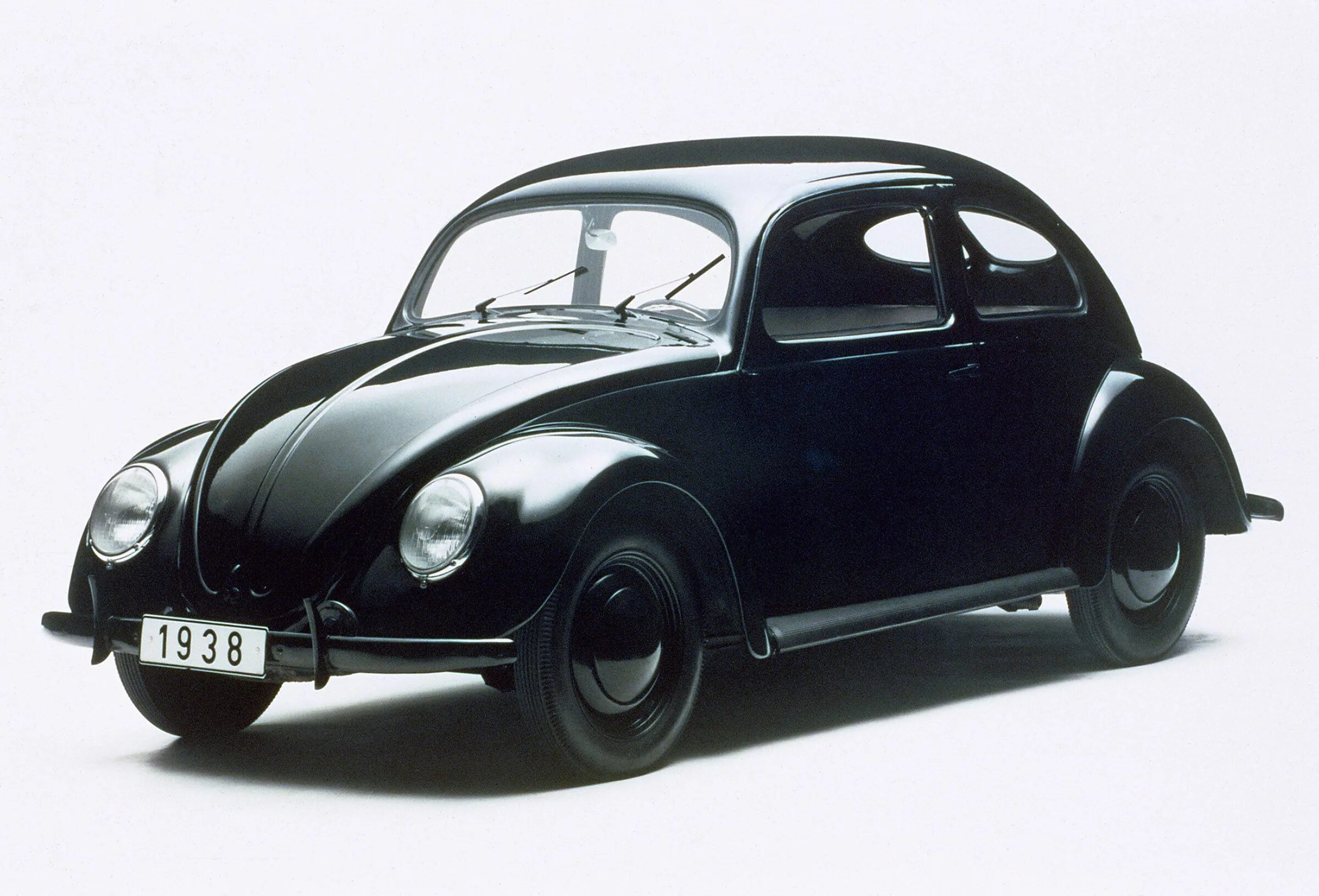 1 автомобиль фольксваген. Volkswagen Käfer – «Жук». 1946. Фольксваген Битл 1938. Volkswagen Beetle Жук 1938. Volkswagen Type 1 1938.