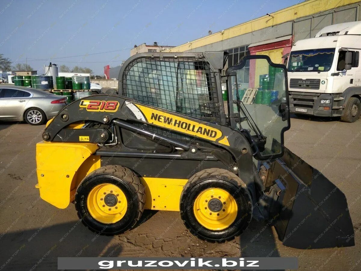 Holland l218. New holland l218 погрузчик. мини погрузчик нью холланд л218. подкачка new holland l218. new holland l218 с бетономешалкой.