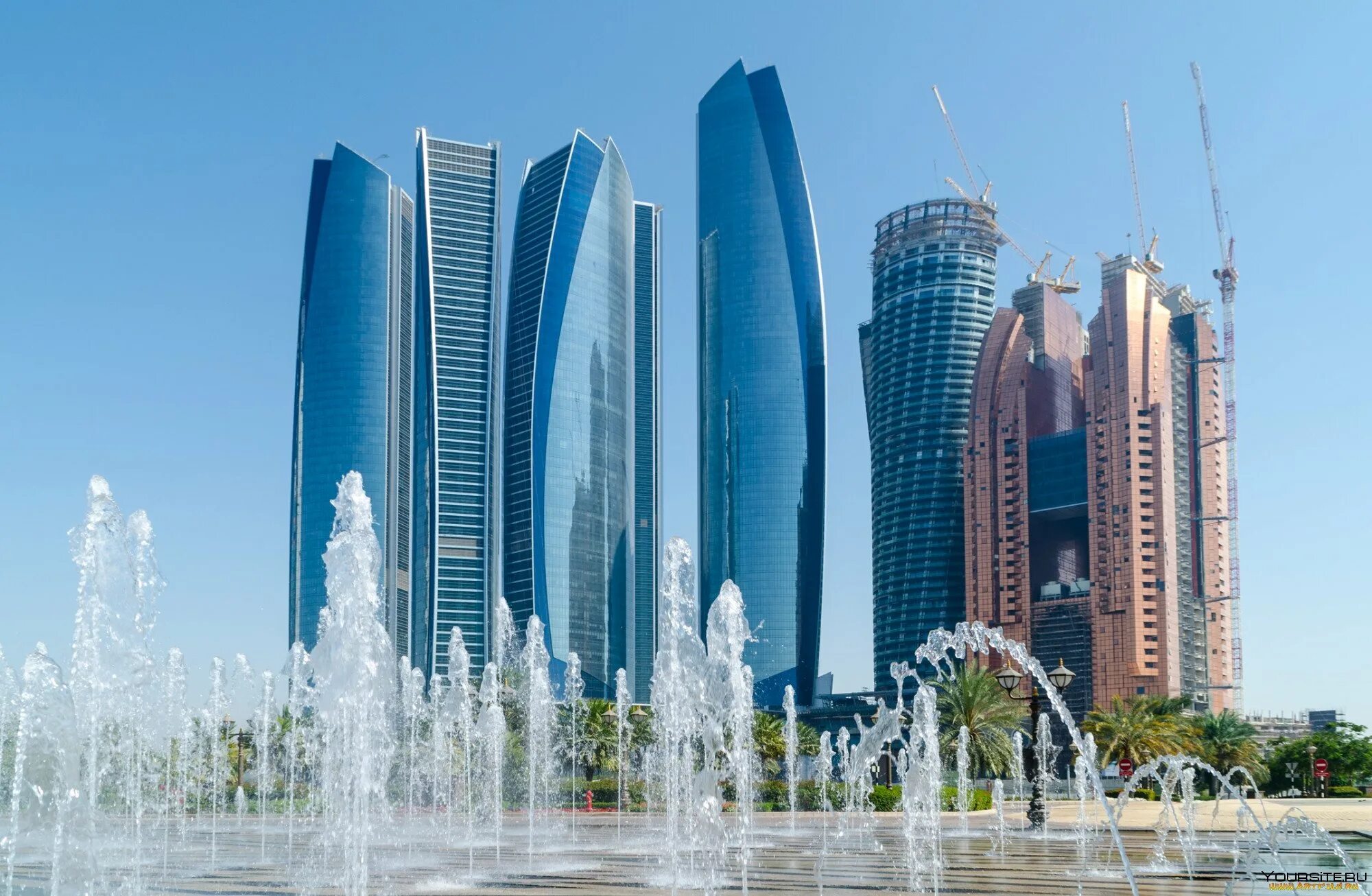 Дубай небоскребы. Небоскребы Абу Даби. Высотки в Абу Даби. Абу Даби 3 башни. ОАЭ фонтаны Дубай в Абу Даби.