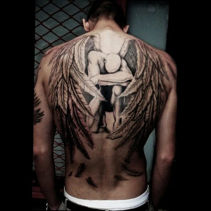 Ангел мужчина спиной. Тату Крылья на спине. Крылья на спине тату мужские. Тату Крылья на всю спину мужская. Татуировка Крылья на спине.