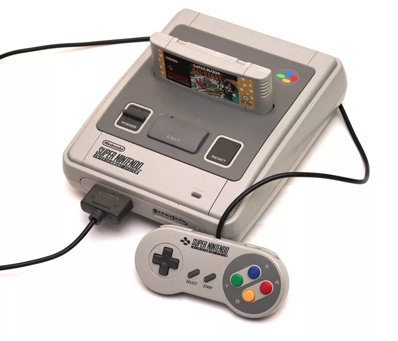 Super snes. Приставка super nintendo. приставка супер нинтендо 1990. super famicom приставка. денди игровая приставка нинтендо.