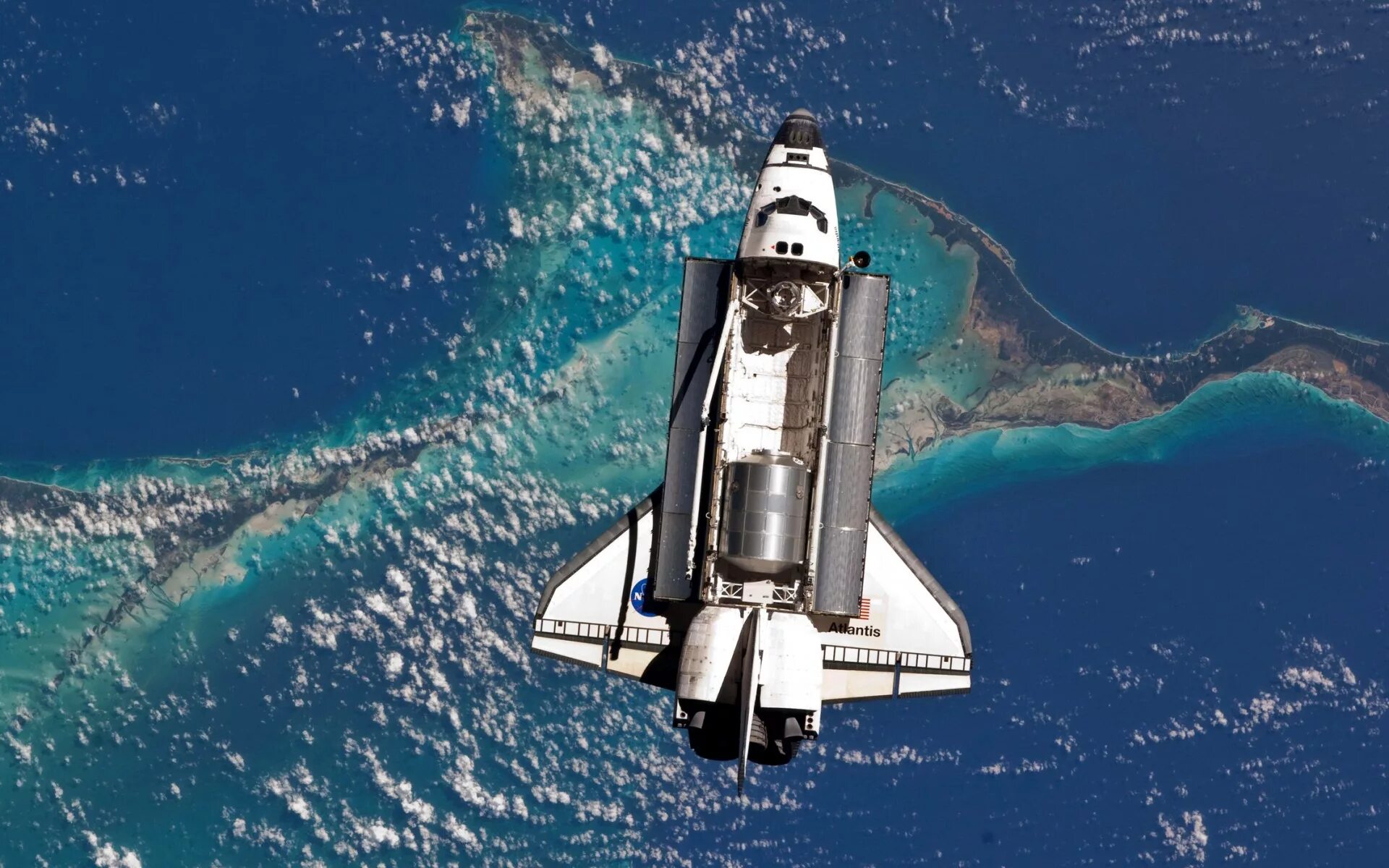 Как называется американский космический корабль. Спейс шаттл космический корабль. Спейс шаттл Атлантис. Космический челнок Атлантис. Космический челнок Спейс шаттл.